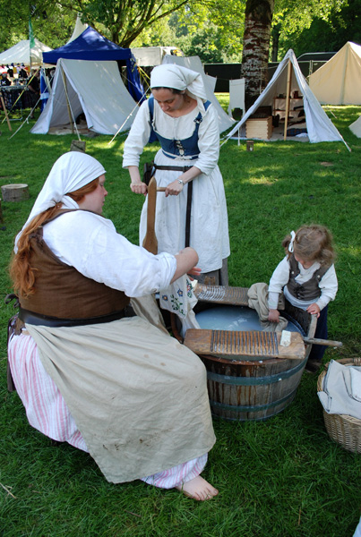 Ann, Mairi and Maisie doing the laundry